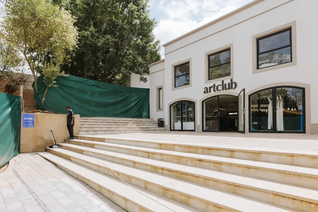 The Artclub building beside a wide flight of steps